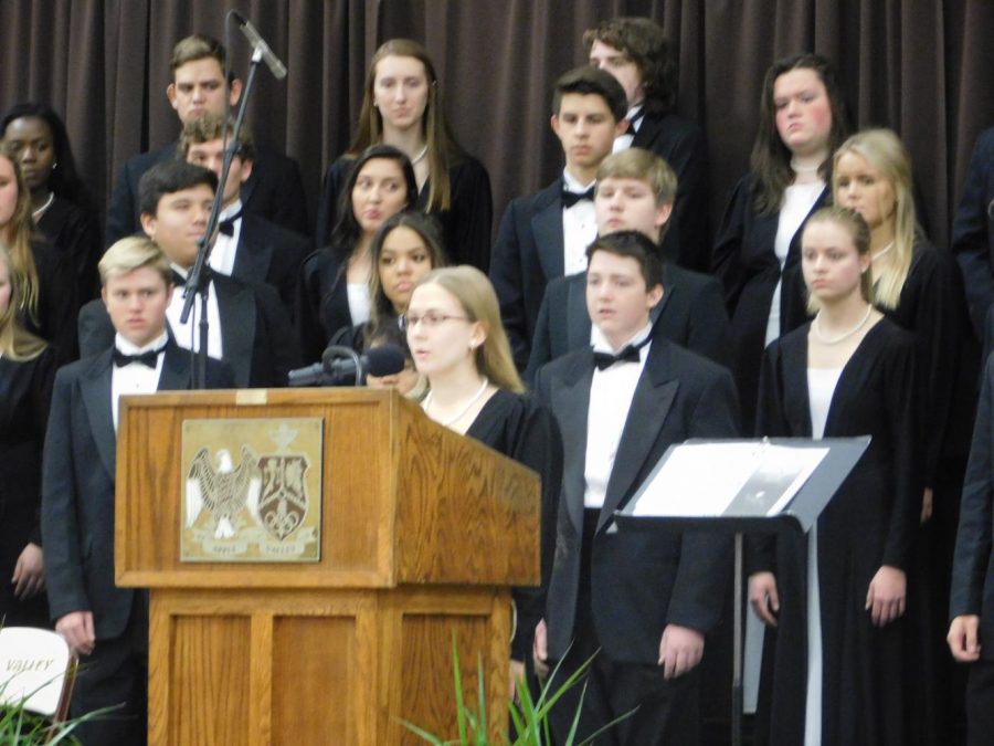 Junior VSC member Amanda Jackson reads poem "Sure on This Shining Night" by James Agee.