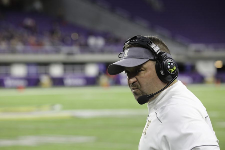 Head coach Chad Clendening looks on during the state semifinal game.