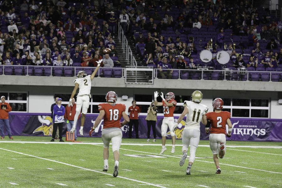 Senior wideout Nathan Macho tips a pass, leading to an interception.