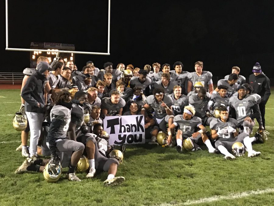 Apple Valley poses after defeating Henry Sibley on Senior Night.